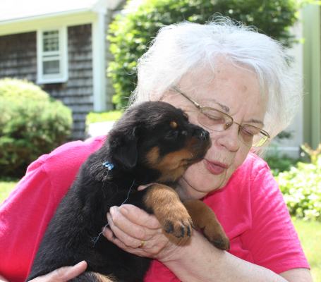 Grammy Rita puppy kisses from Blue girl